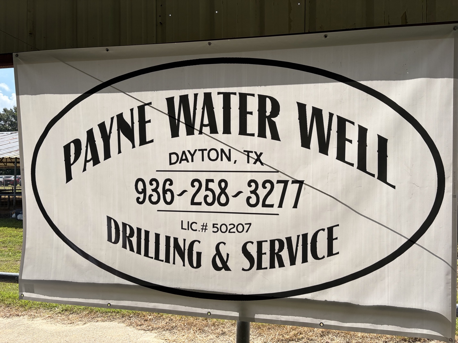 Payne Water Well sponsor banner displayed at the local FFA show